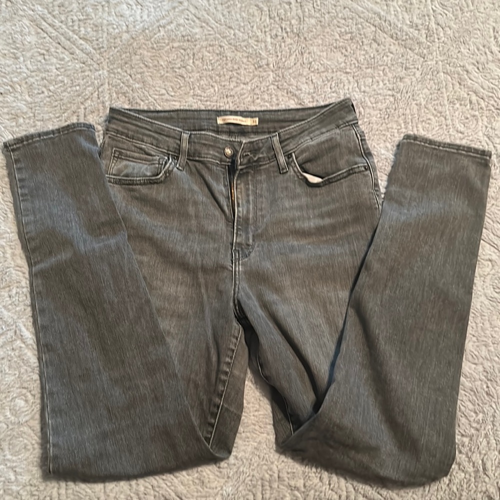 Woman’s grey Levi’s 721 high rise skinny size 31